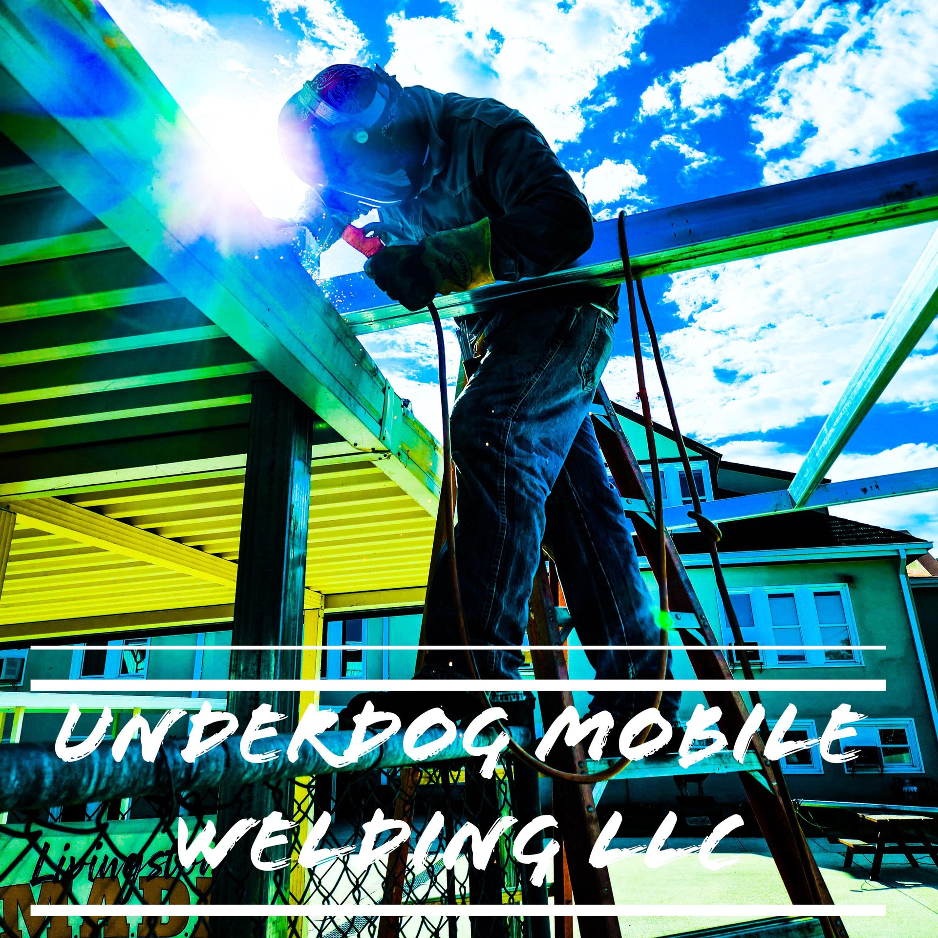 Welder working on metal structure